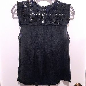 Women's black blouse.